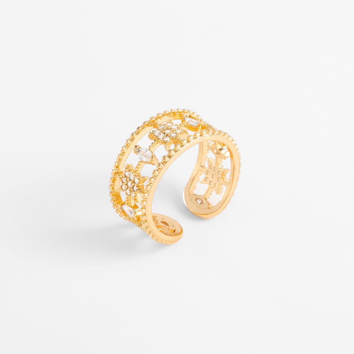 Anillo en baño de oro diseño calado piedras toque brillante