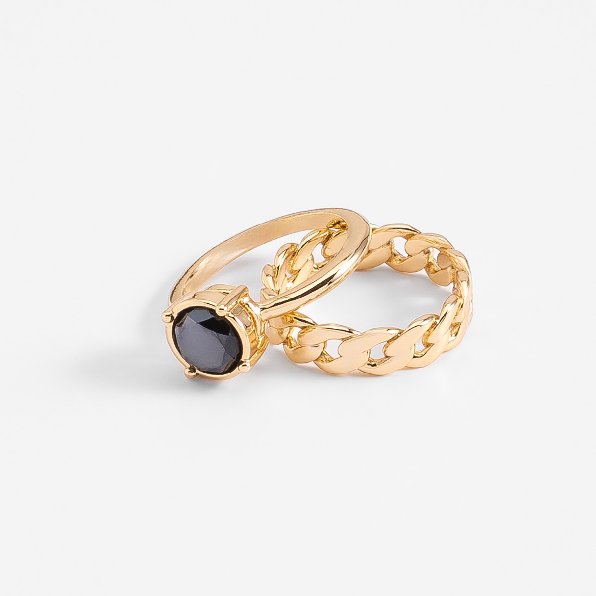 Anillos en baño de oro con piedra negra diseño moderno set