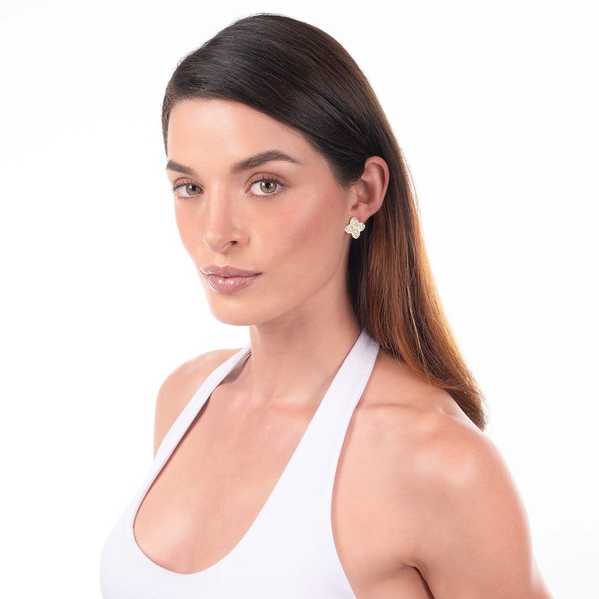 Aretes en baño de oro forma trébol piedras tono cristal