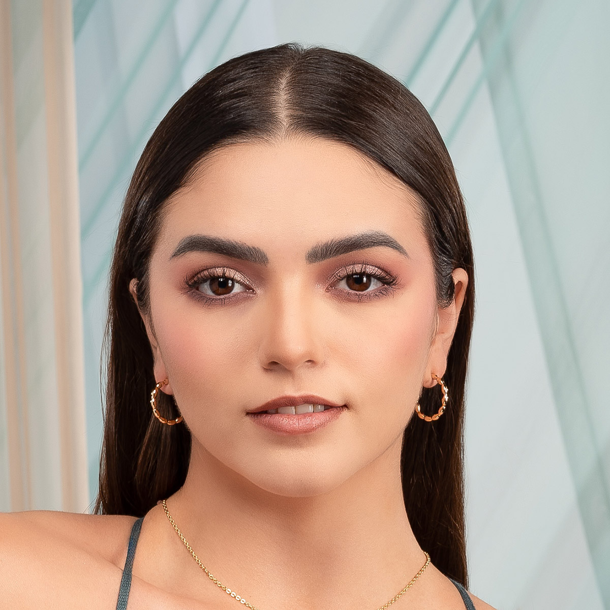 Aretes en baño de oro diseño argolla con eslabones ovalados