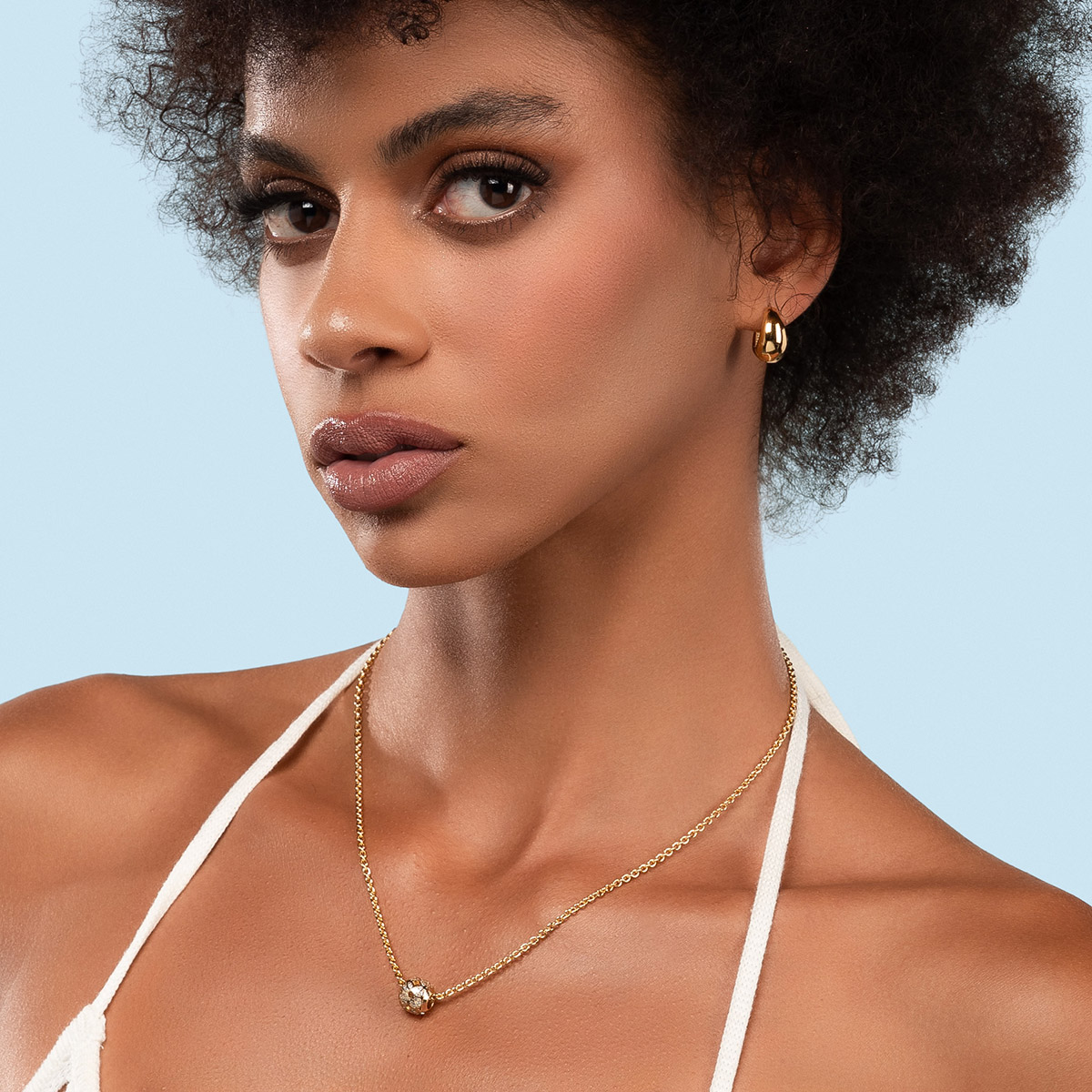 Aretes tipo arracada en baño de oro