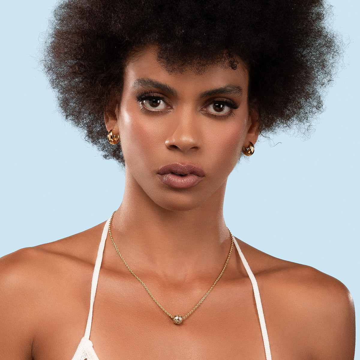 Aretes tipo arracada en baño de oro