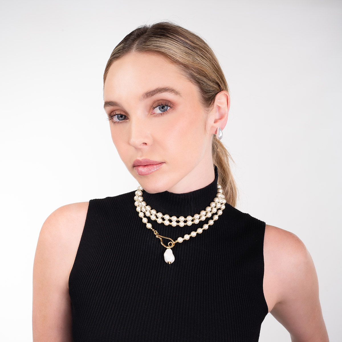 Aretes sin baño diseño moderno perla tono blanco pulido