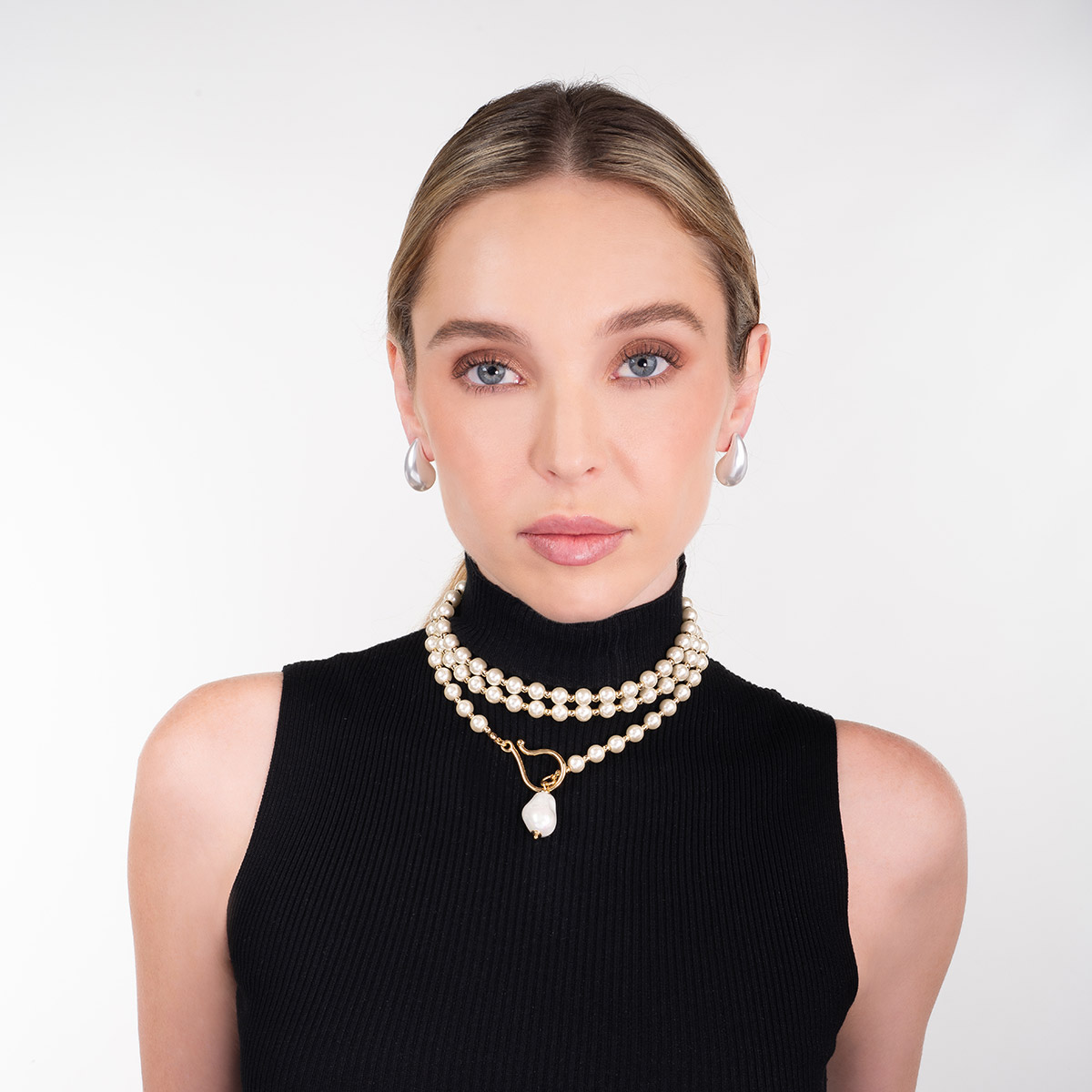 Aretes sin baño diseño moderno perla tono blanco pulido