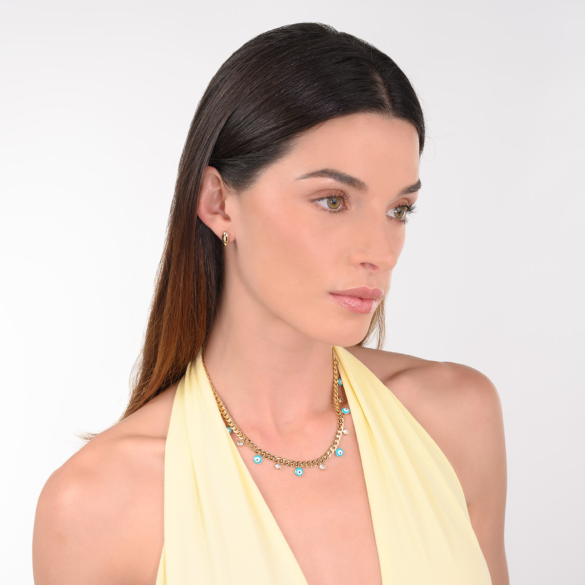 Aretes en baño de oro diseño ovalado pulido minimalista