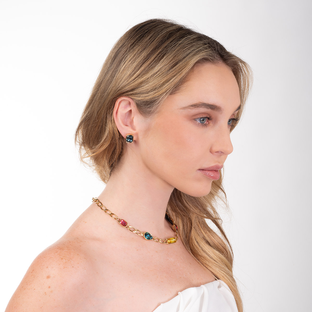 Aretes en baño de oro rectangulares piedra tono aqua brillante