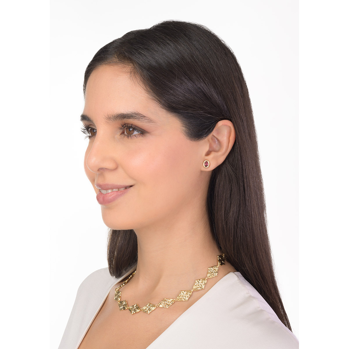 Gold plated earrings with an intense pink oval stone, the contemporary accent that adds color and sophisticated personality to your look.