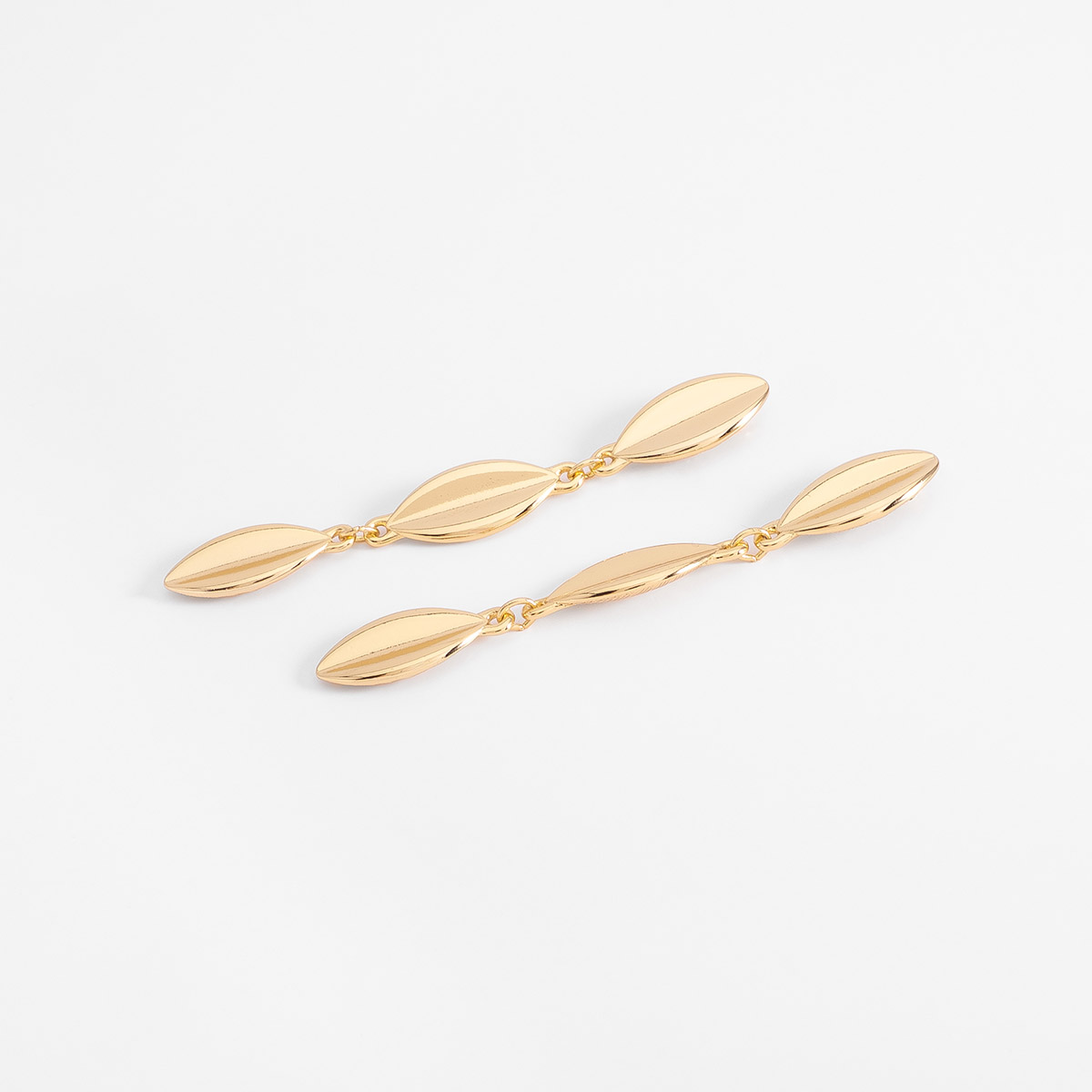 Aretes poste en baño de oro diseño triple elipse lisa