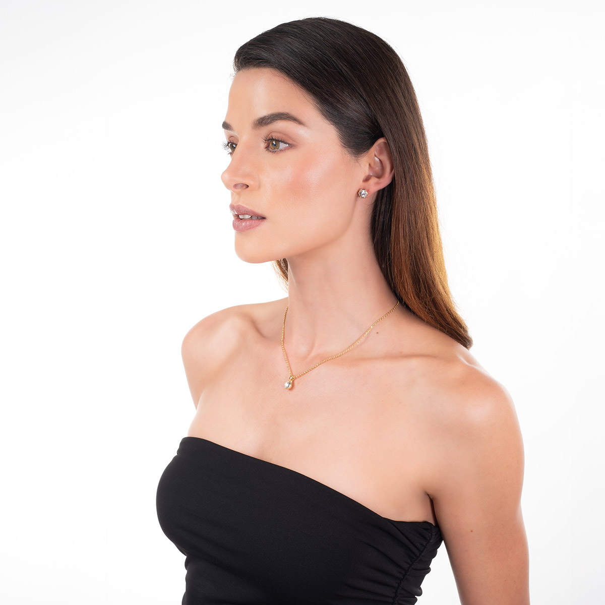 Aretes en baño de oro piedra central toque brillante redonda