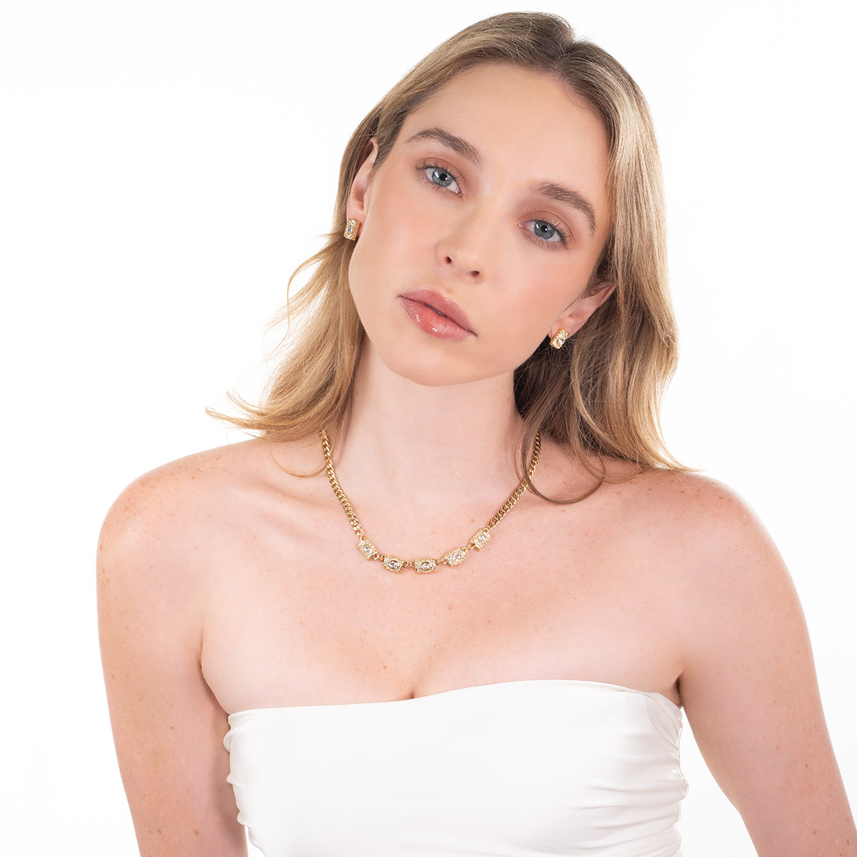 Aretes en baño de oro rectangulares piedras toque brillante