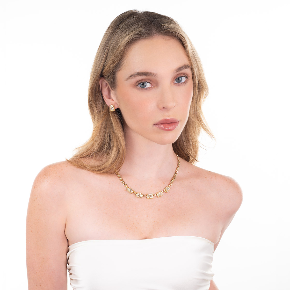 Aretes en baño de oro rectangulares piedras toque brillante