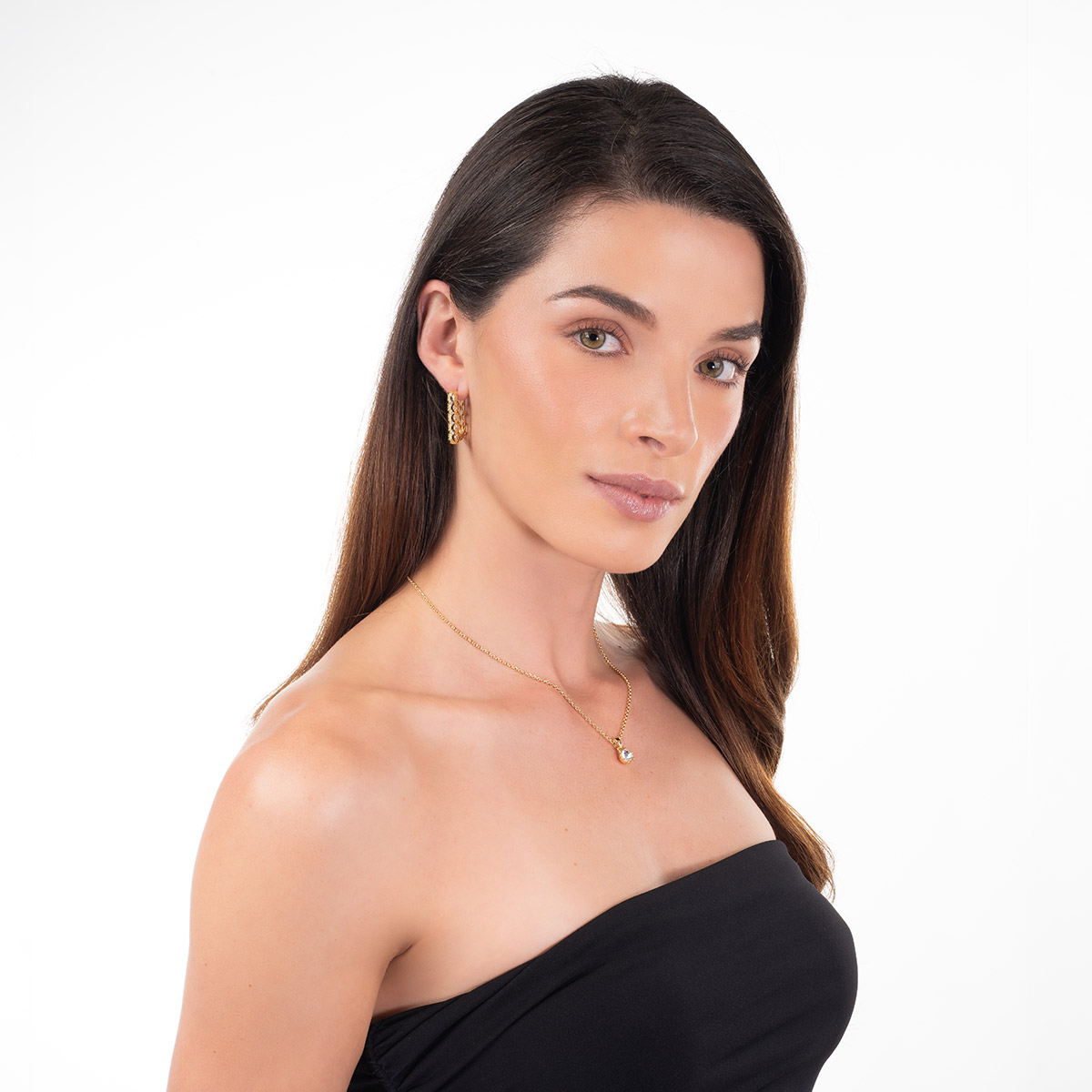 Aretes en baño de oro forma rectangular piedras toque brillante