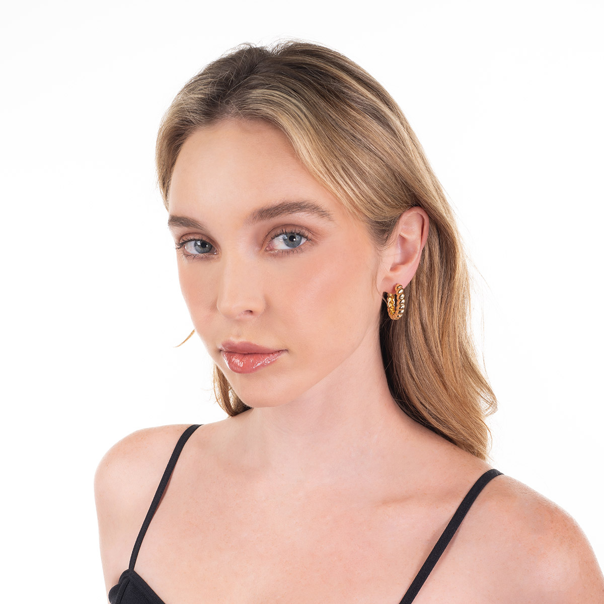 Aretes en baño de oro diseño aro trenzado voluminoso