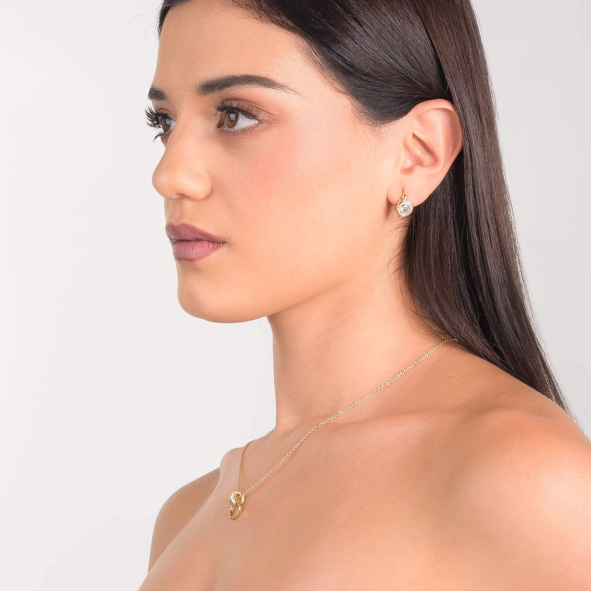 Aretes en baño de oro con diseño circular y Diamonice