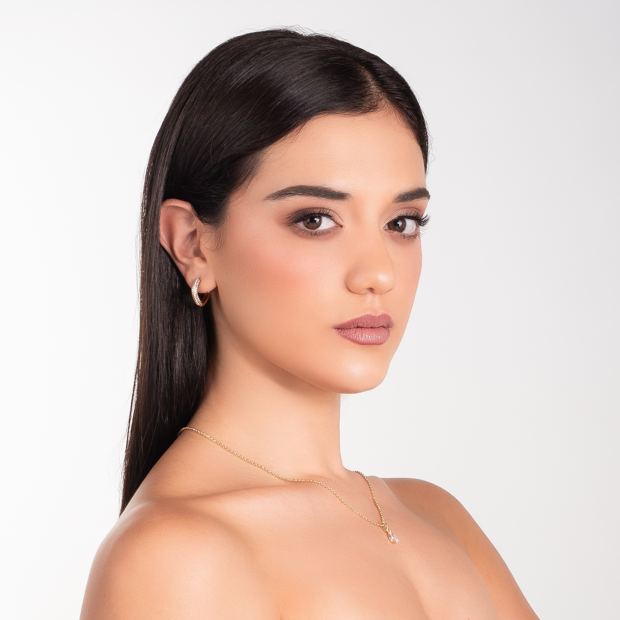 Aretes en baño de oro embellecidos con Diamonice