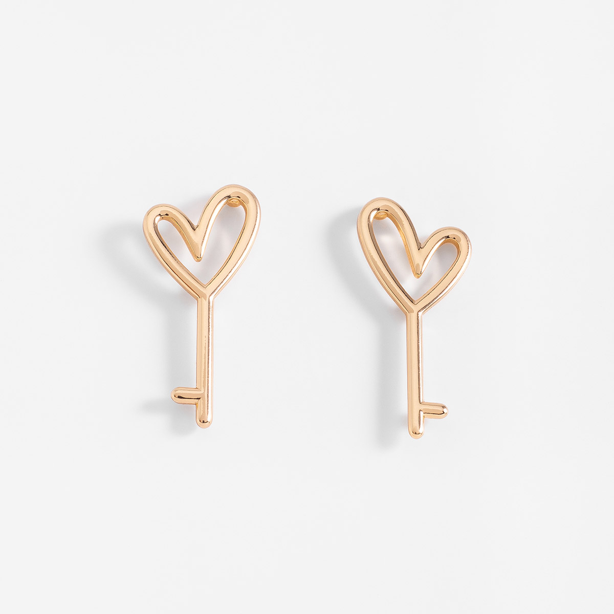 Aretes en baño de oro diseño llave corazón 3.8 cm x 1.7 cm