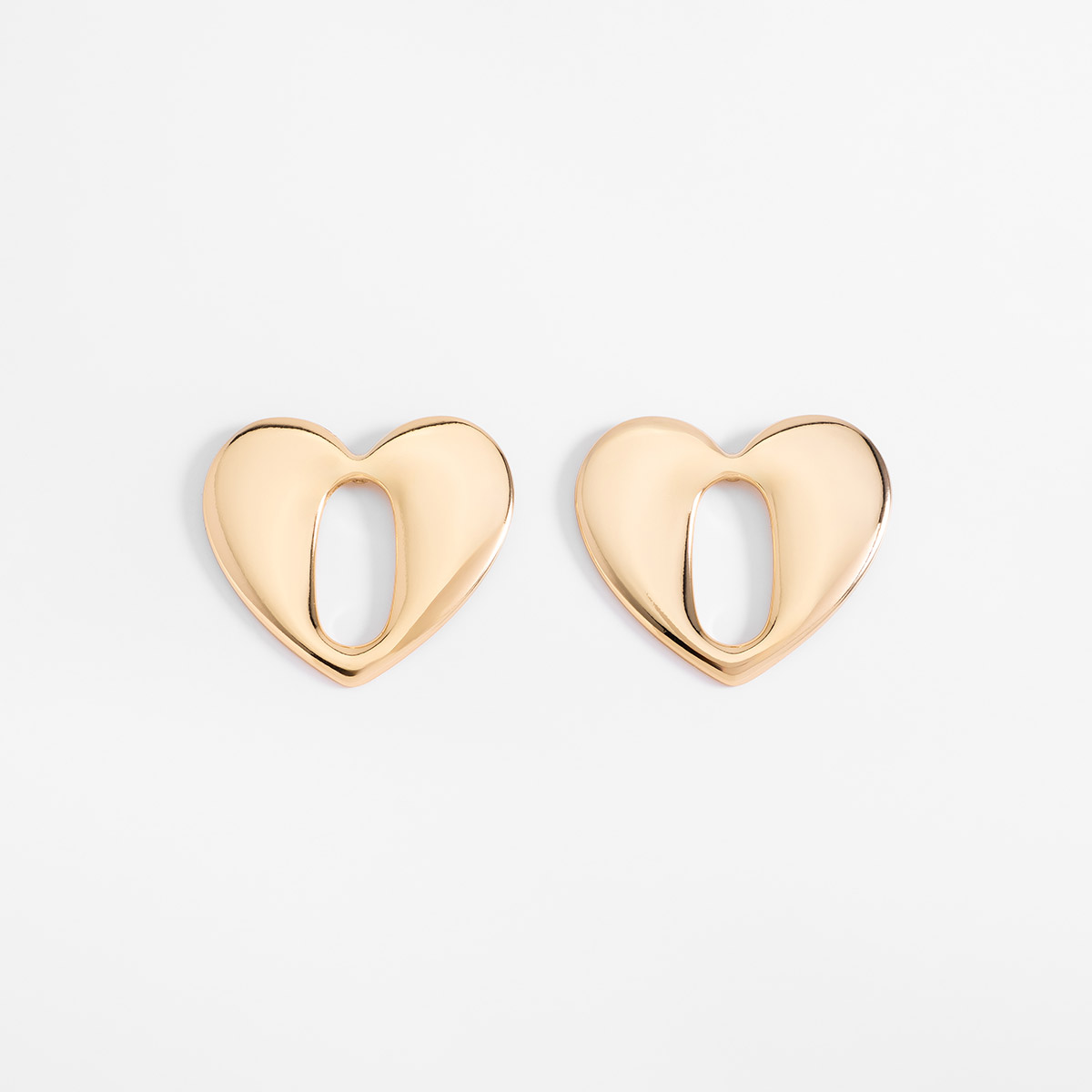 Aretes en baño de oro diseño corazón calado 3.5 cm x 3.8 cm
