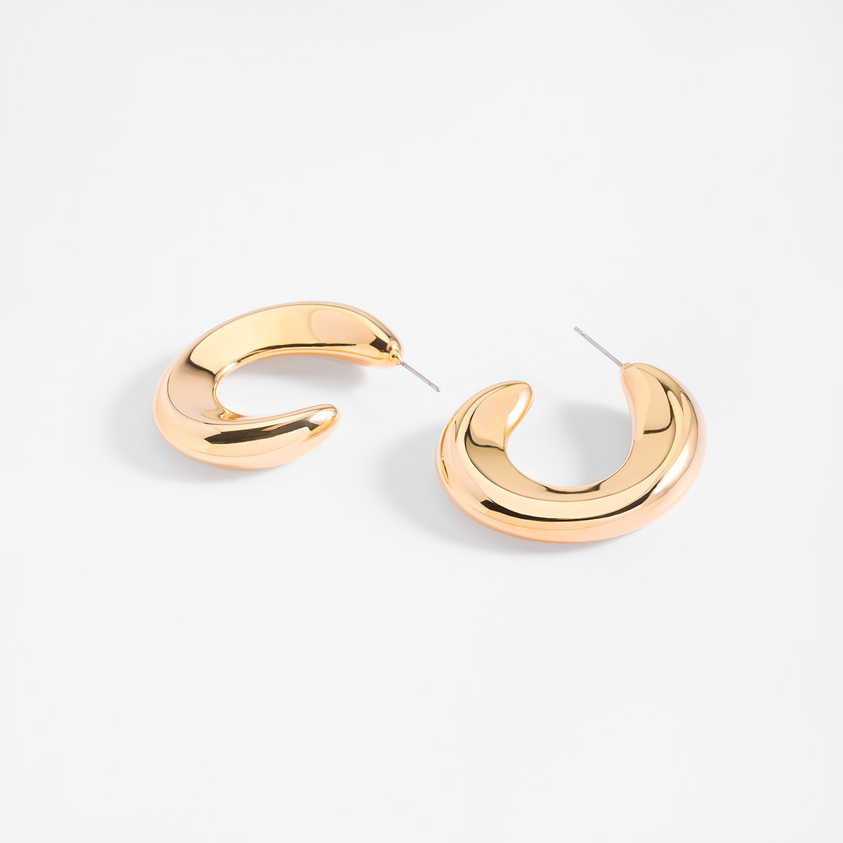 Aretes en baño de oro diseño circular voluminoso ancho 3.5 cm