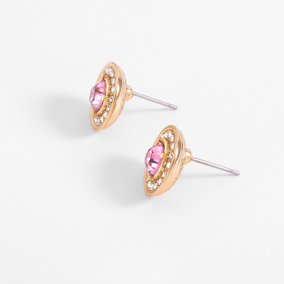 Aretes poste en baño de oro diseño circular brillante rosa