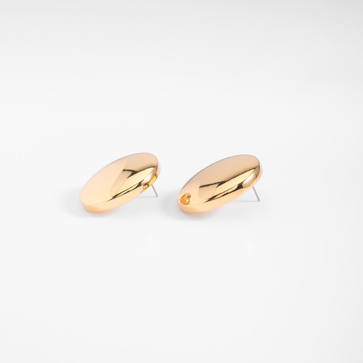 Aretes en baño de oro diseño circular pulido diámetro 3.5 cm