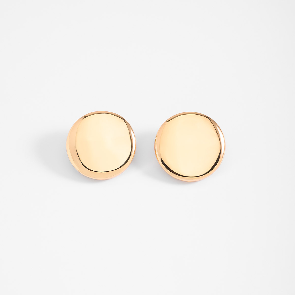 Aretes en baño de oro diseño circular pulido diámetro 3.5 cm