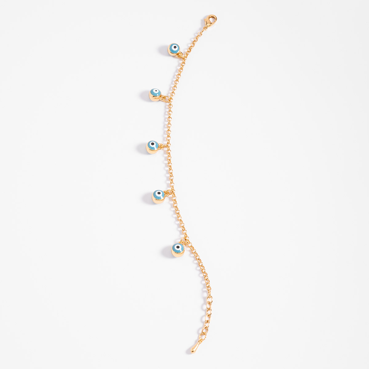 Pulsera en baño de oro con dijes colgantes de ojo esmaltado en azul