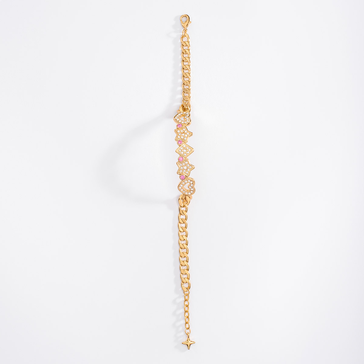 Pulsera de 18 cm + 2 cm de ext, en baño de oro, con piedras en tono rosa y cristal.