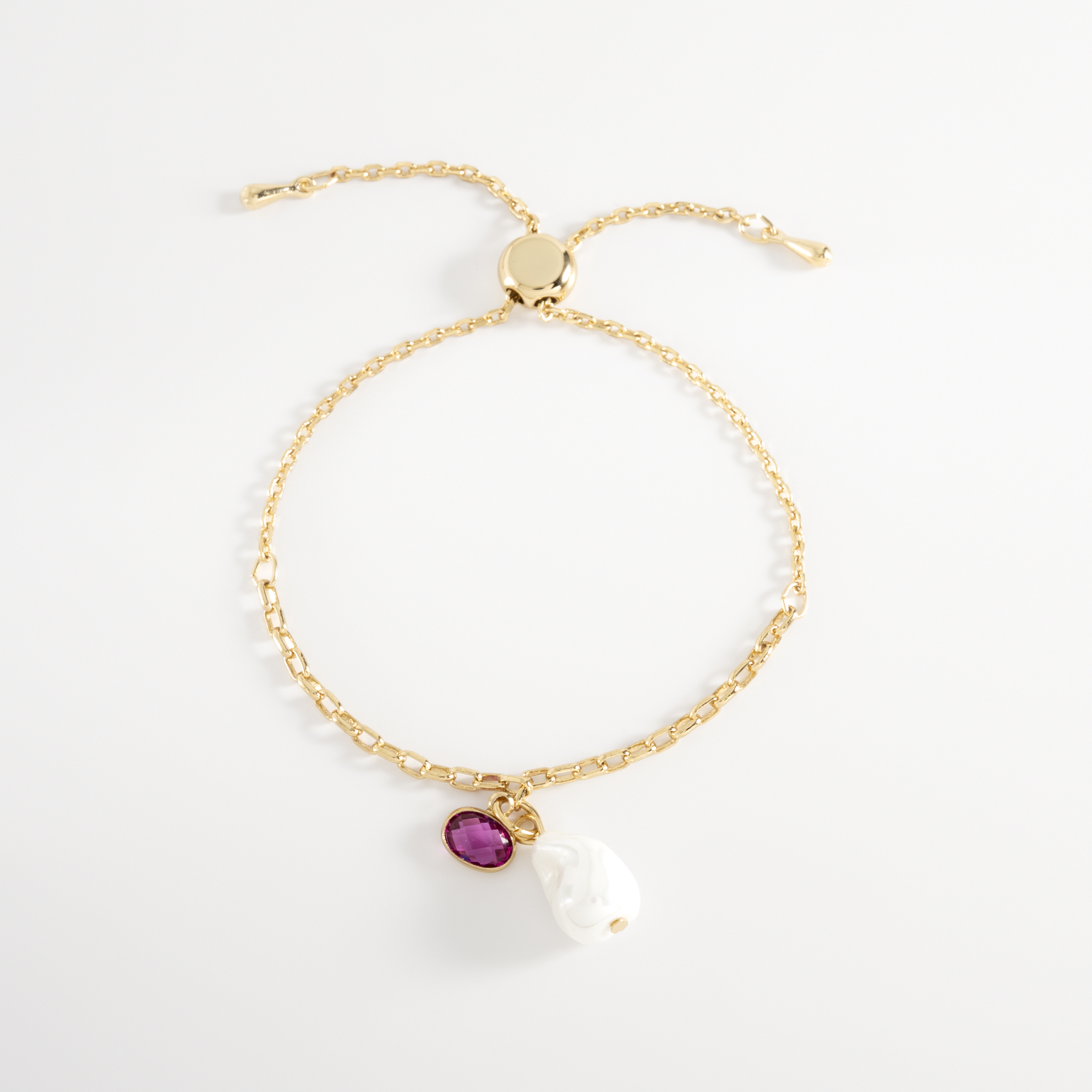 Pulsera perla ajustable en oro con piedra rosa