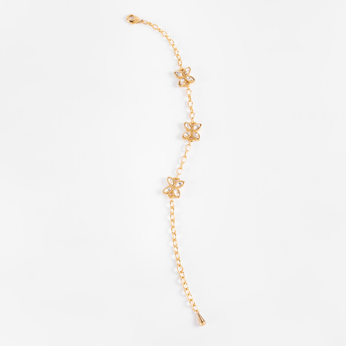 Pulsera en baño de oro flores piedras con toque brillante