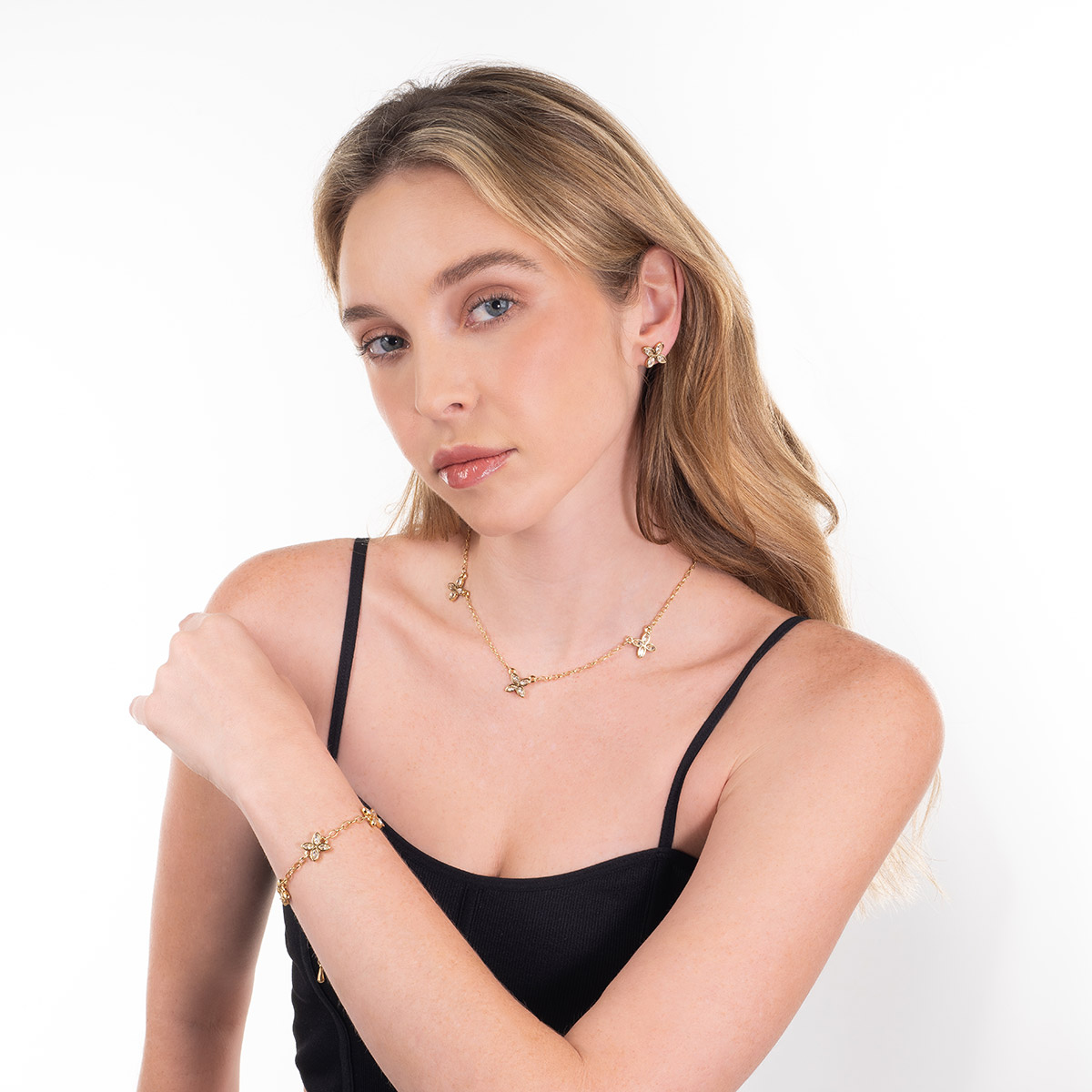 Pulsera en baño de oro flores piedras con toque brillante