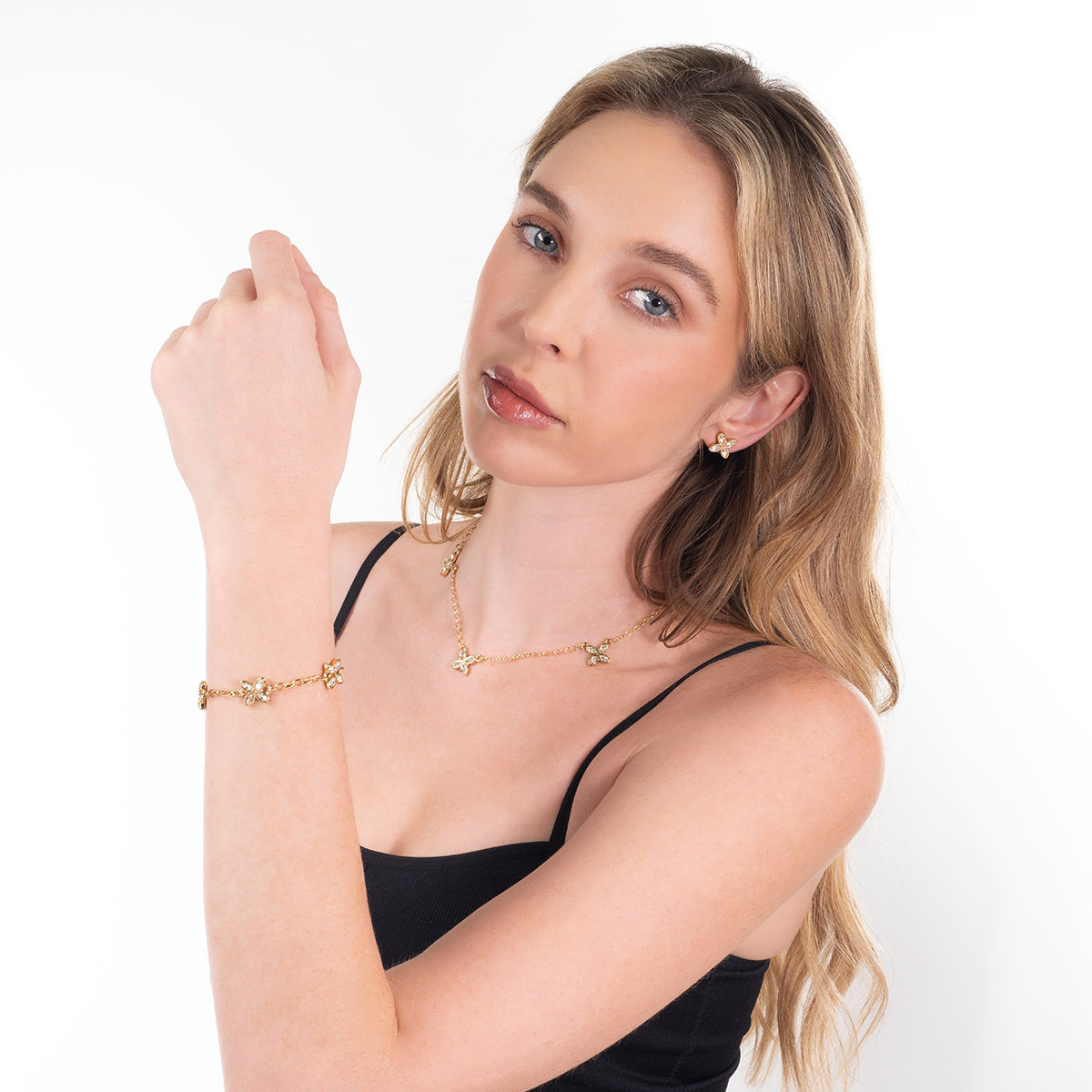 Pulsera en baño de oro flores piedras con toque brillante