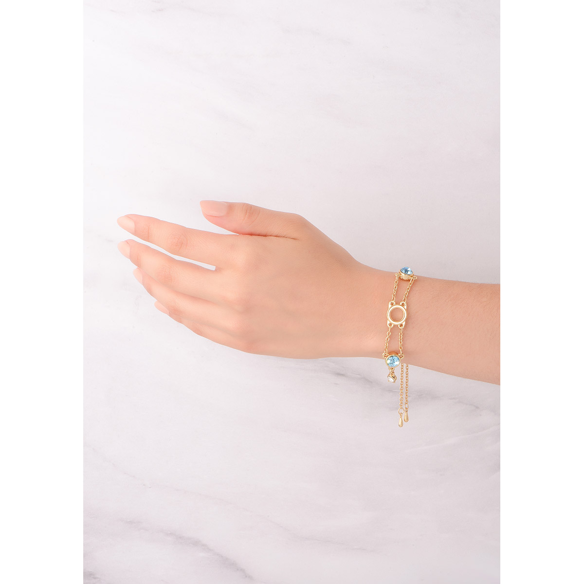 Pulsera baño de oro 18k con diseño y piedras azules