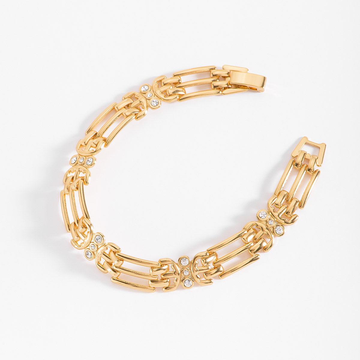 Pulsera en baño de oro con eslabones y piedras incrustadas Pulsera en baño de oro con eslabones y piedras incrustadas