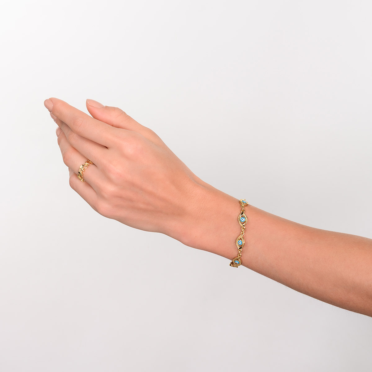 Pulsera en baño de oro dijes ojo turco turquesa moderno