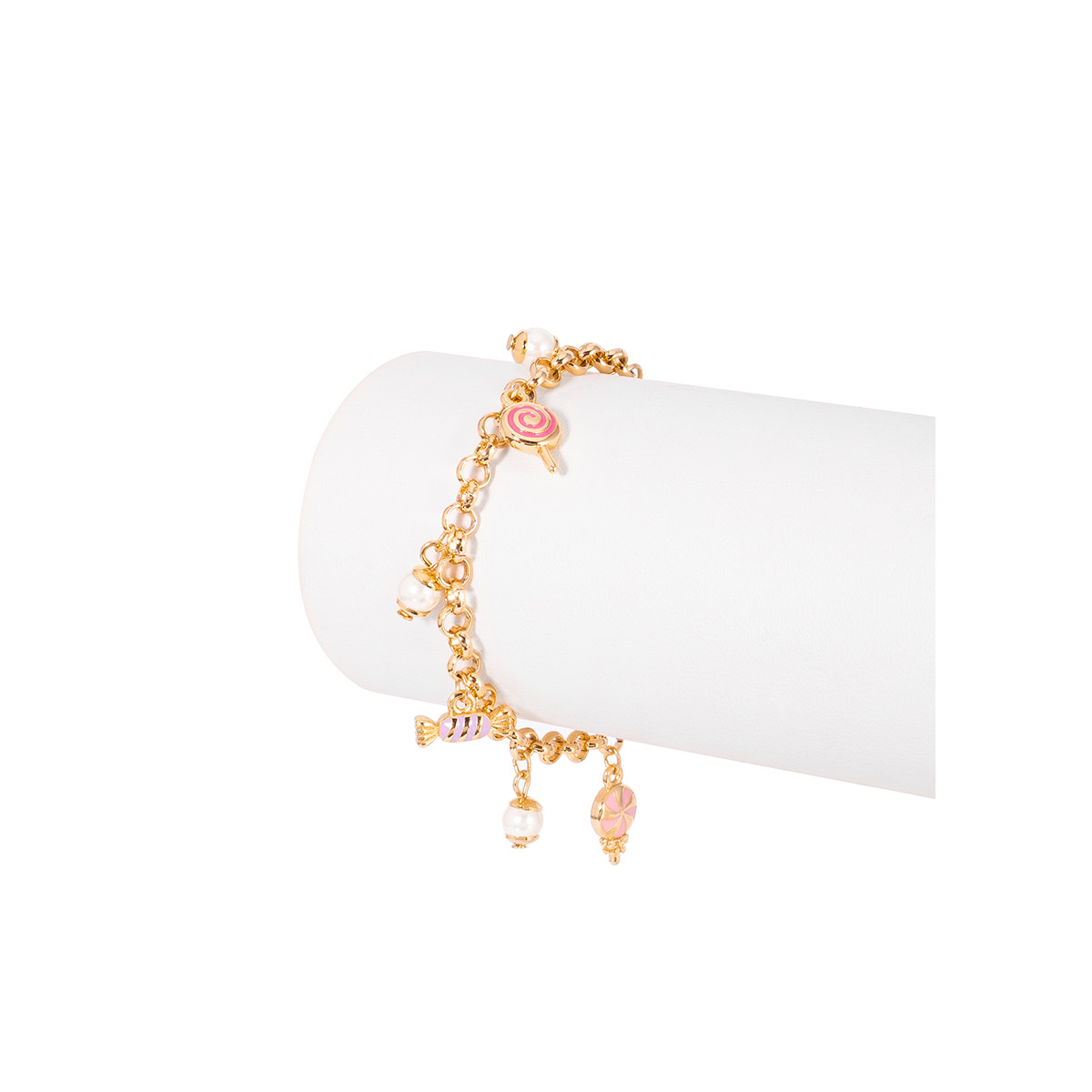 Pulsera en baño de oro con dijes de caramelos y detalles en esmalte en tonos crema y rosa