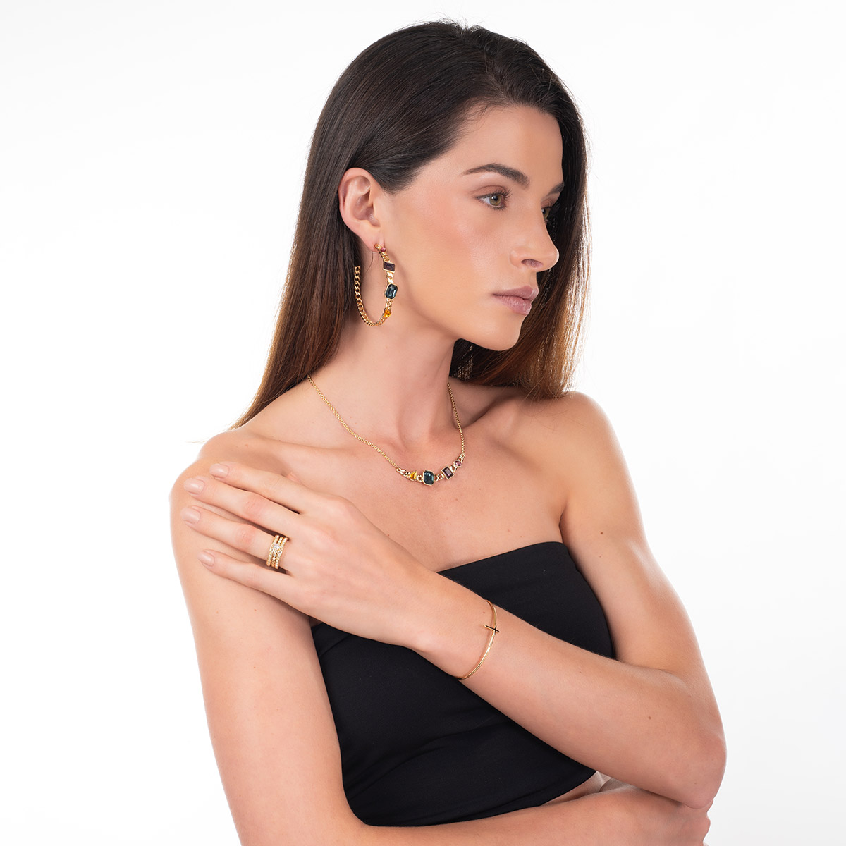 Pulsera en baño de oro diseño cruz minimalista abierta