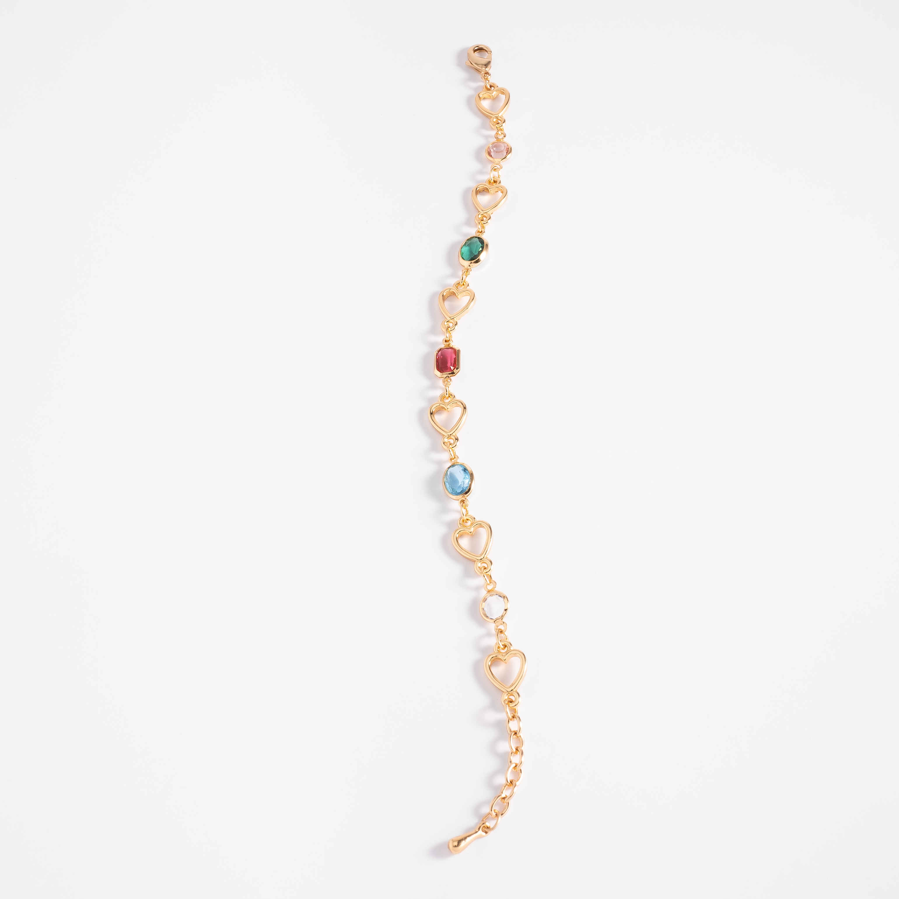 Pulsera en baño de oro con eslabones de corazones y piedras