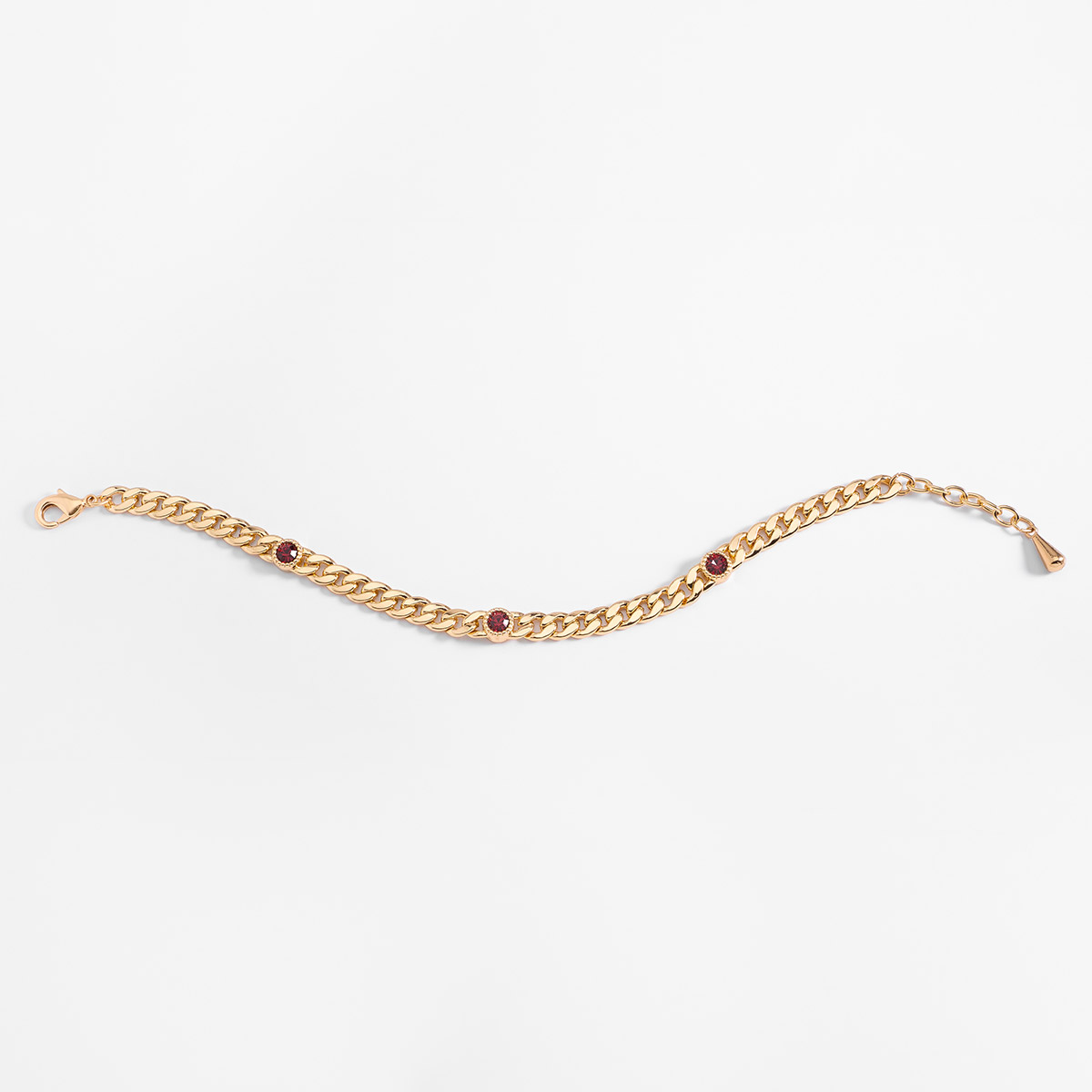 Pulsera en baño de oro con eslabones y piedras rojas largo 20 cm