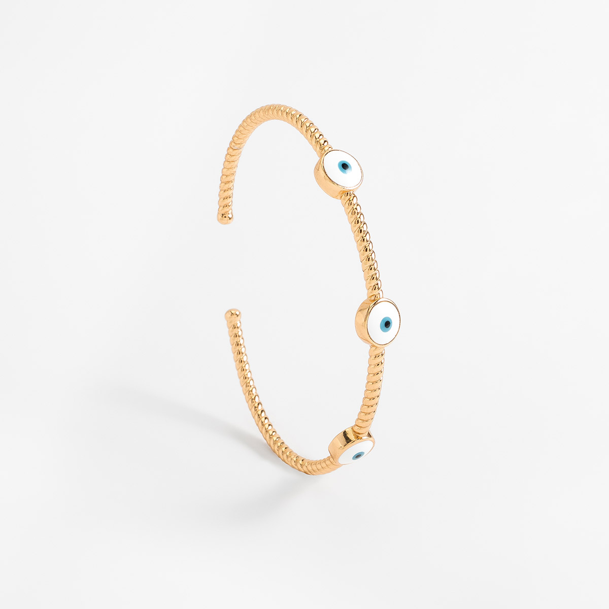 Pulsera rígida en baño de oro con dijes de ojo turco 6 cm