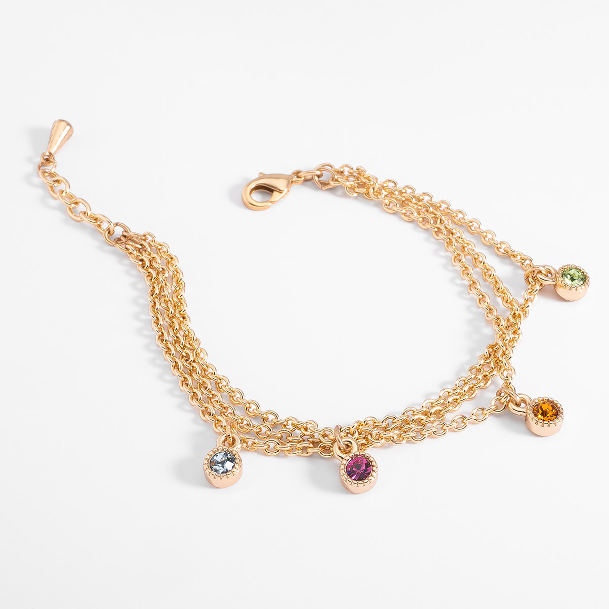 Pulsera en baño de oro con dijes de piedras de color largo 18 cm + 2 cm ext