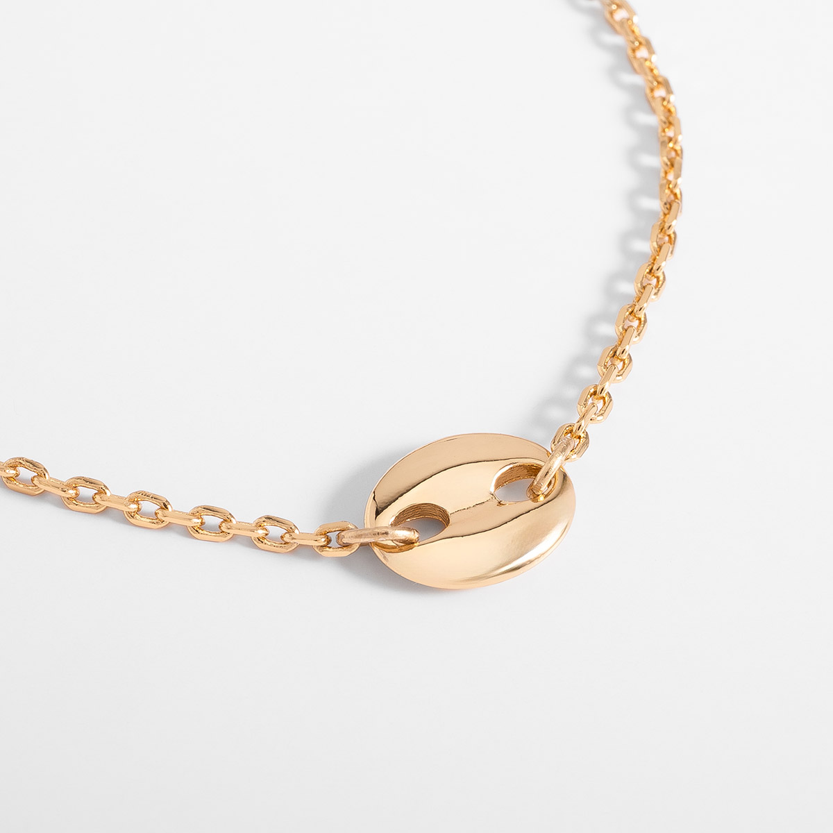Pulsera en baño de oro cadena fina medalla circular largo ajustable