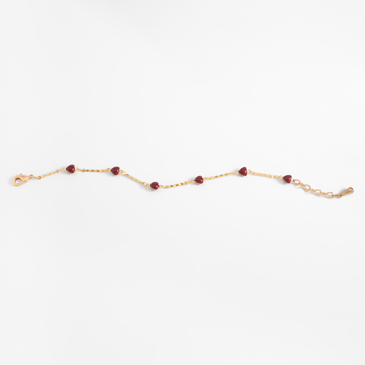 Pulsera en baño de oro con corazones esmaltados rojos