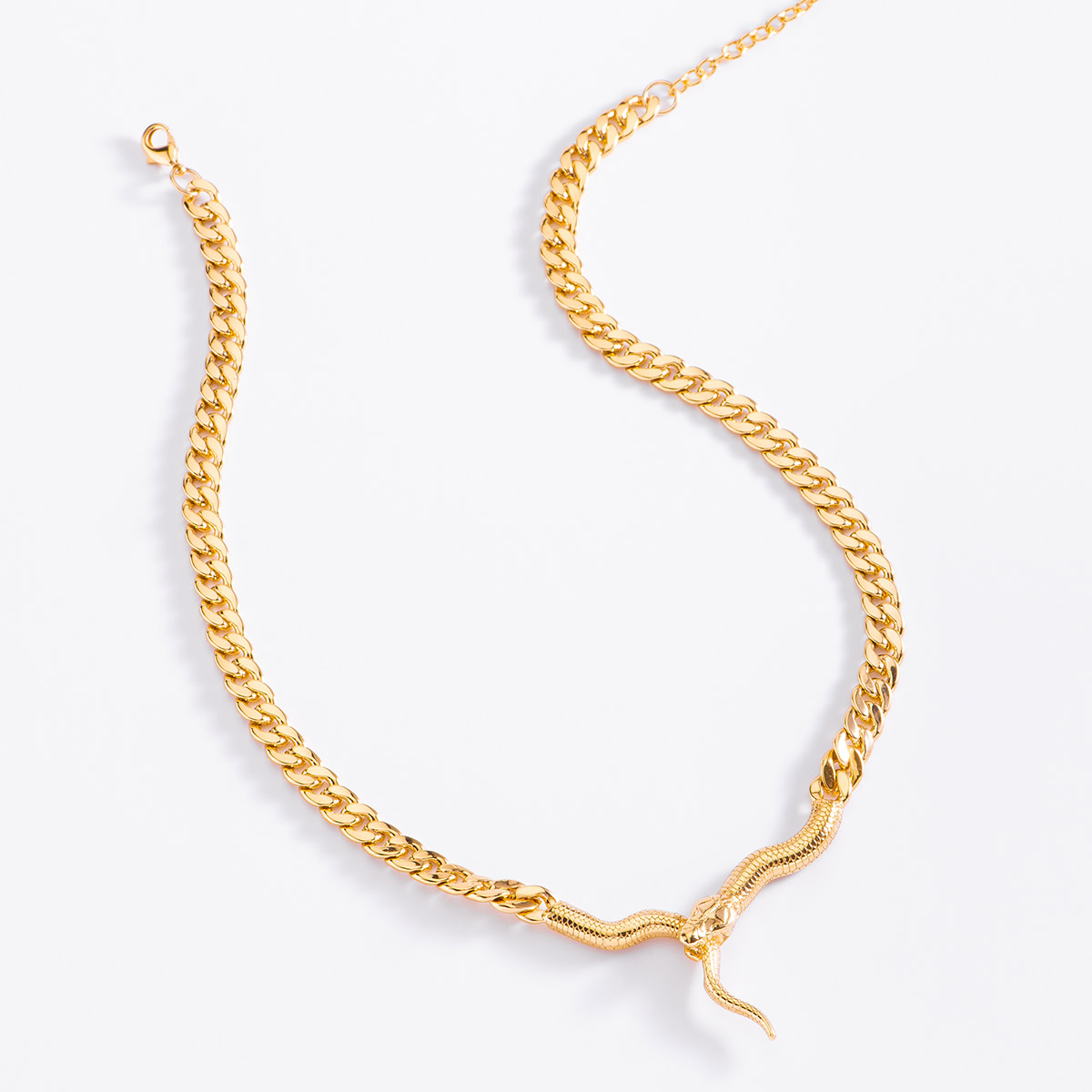 Collar con forma de serpiente de 42 cm + 10 cm de ext, en baño de oro.