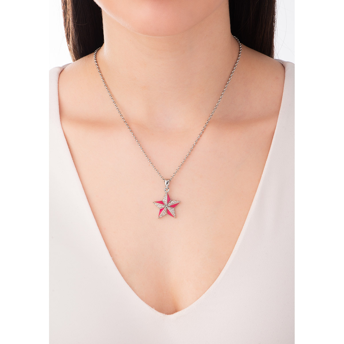 Este hermoso collar de nuestra colección Paris by NICE en baño de platino con dije de estrella 3D con esmalte en tono rosa y finas piedras en tono cristal.
-        Collar 42 cm + 10 cm ext.
-        Baño de Platino
-        Piedras en tono cristal
-        Esmalte en tono rosa.
-        Colección Paris By NICE
