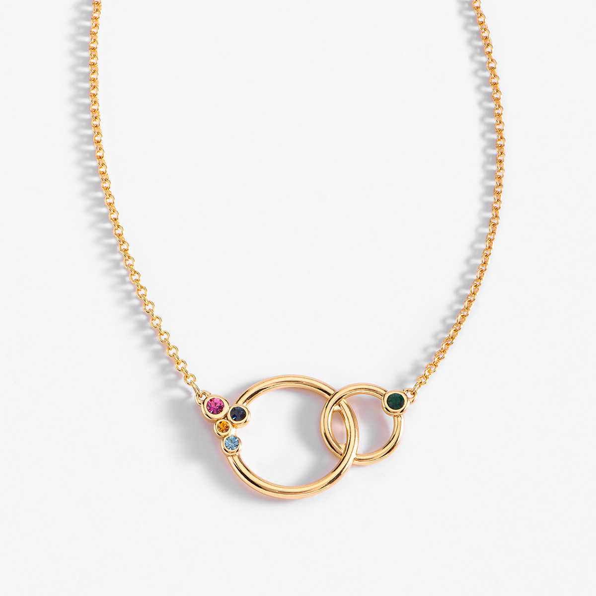 Collar baño oro con piedras esmeralda y más tonos