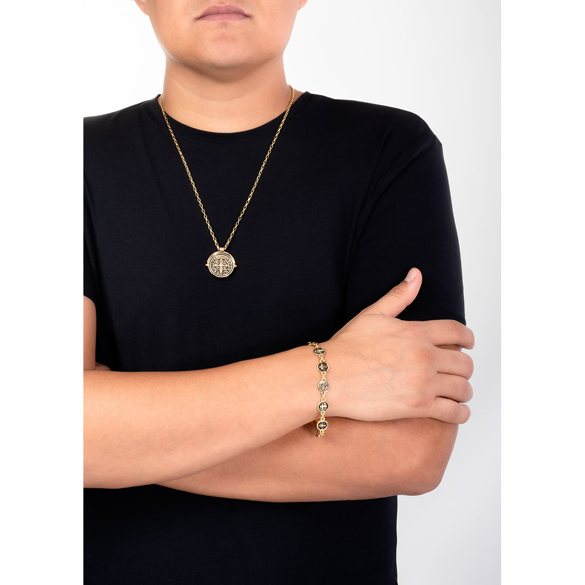 Gold plated necklace with a classic medallion pendant, a modern piece that adds a meaningful, distinctive detail to enhance any look.