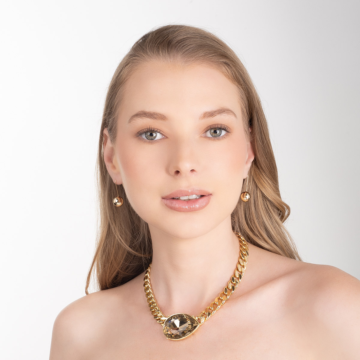 Collar en baño de oro eslabones y piedra tono ahumado