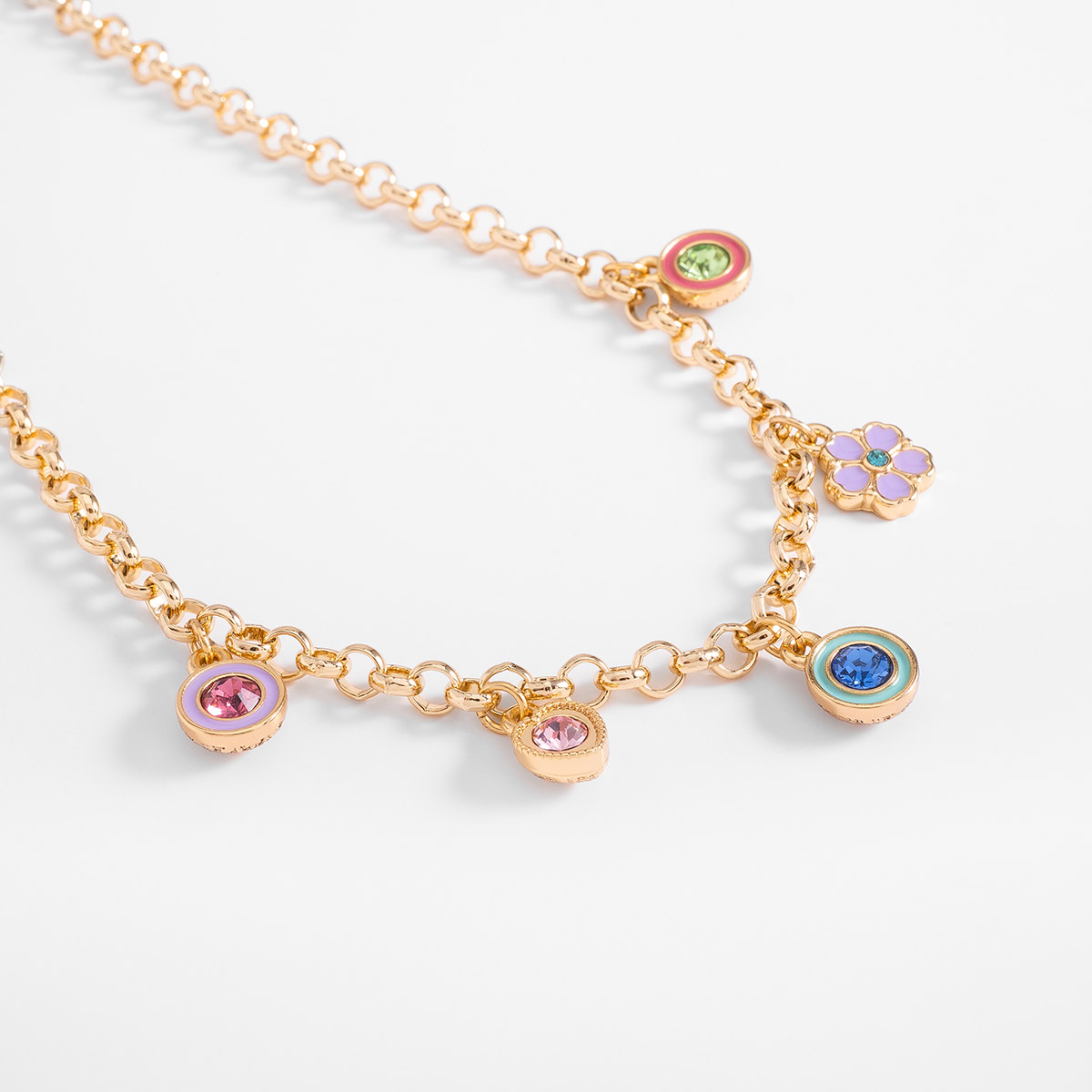 Collar en baño de oro dijes coloridos y flor esmalte pastel
