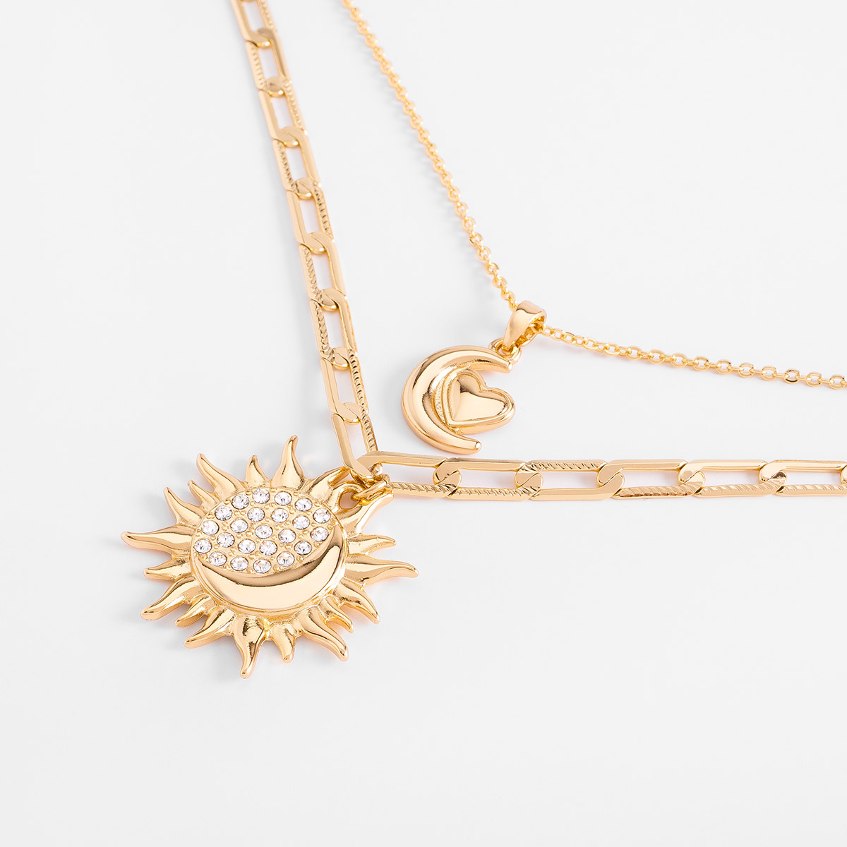 Collar en baño de oro doble dije sol luna y corazón 42 cm + 10 cm
