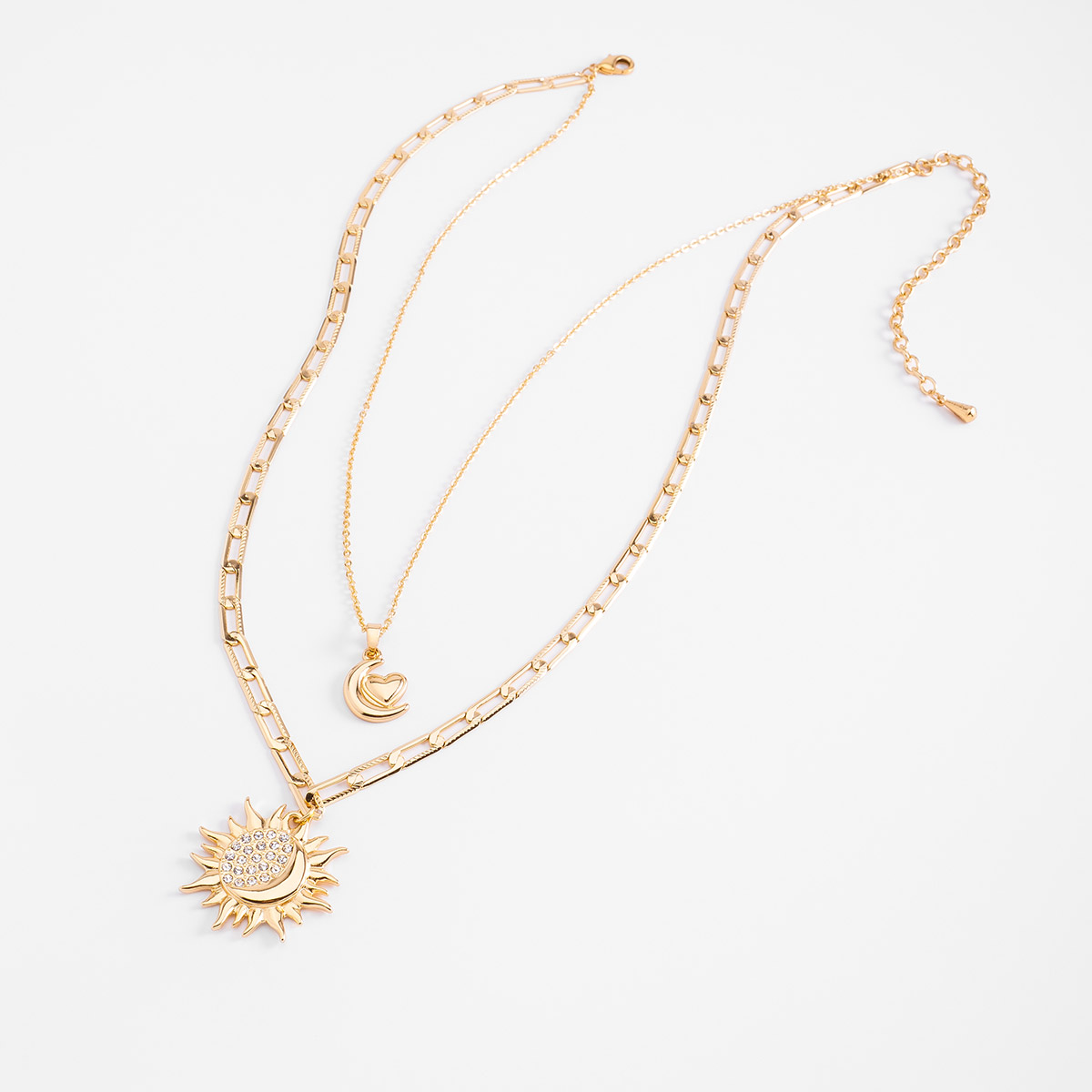Collar en baño de oro doble dije sol luna y corazón 42 cm + 10 cm